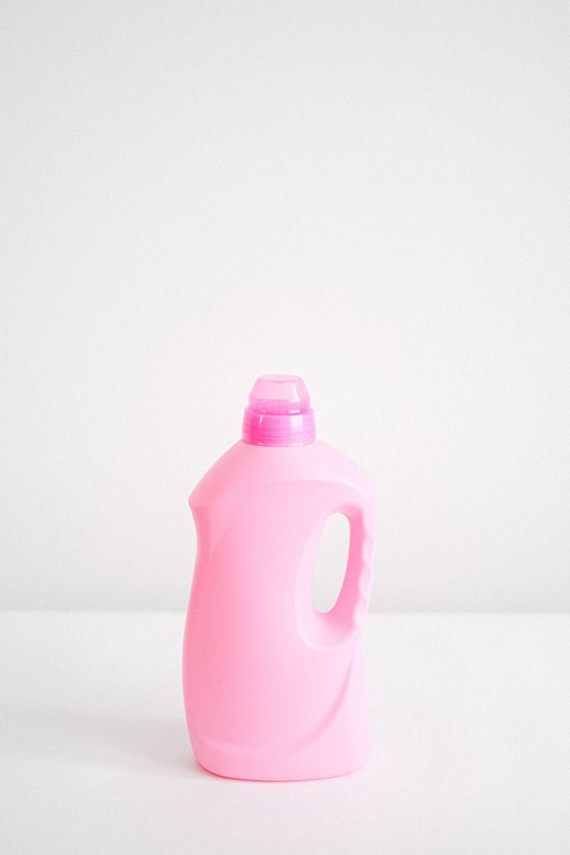 Photo by Anna Shvets Plastic bottle of fabric softener chemical liquid for washing and household chores against white background