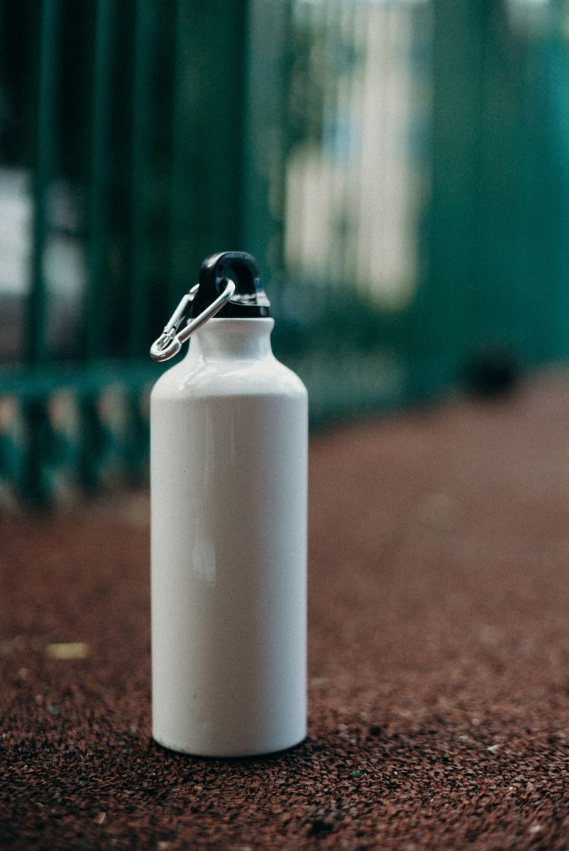Photo by cottonbro studio White eco-friendly water bottle on a sports track promotes zero waste and sustainability.